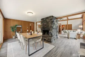 Dual sided fireplace anchors the great room.