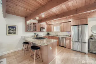 Warm and inviting kitchen with eating area.