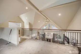 Large loft overlooks main living area and is soaked in natural light