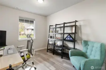 Main floor bedroom currently used as an office.