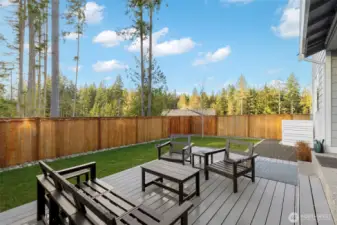 Spacious and fully fenced backyard backing to the greenbelt.