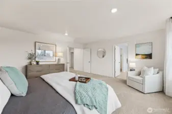 Primary bedroom can accommodate a King size mattress and more. Photo is representational. Actual home is under construction and colors, materials, and finishes may vary. See site agent for details.