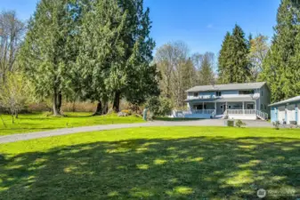 Down a Country Lane Nestled on 5 Parklike Acres!