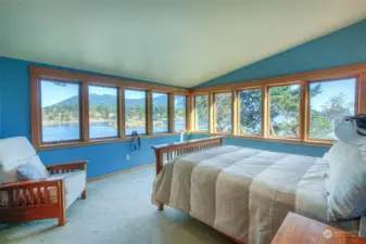 Primary bedroom with views of Cooper Island and Mt. Constitution.