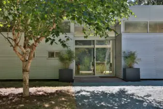 Covered entry porch. Take off your shoes and step through the glass doors onto bamboo floors....