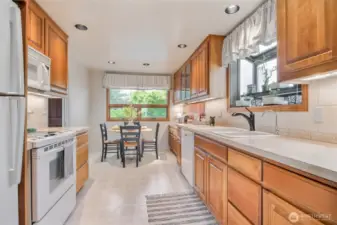 The galley kitchen also features an eating area