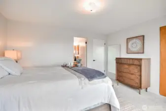 The spacious Primary Suite features a private bathroom and closet