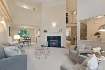Main floor with circular floor plan and vaulted ceilings.