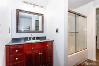 Main bathroom has full tub/shower and 1 sink.
