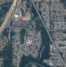 Red arrow is entrance to Wild Waves. In relation to purple icon that is house. Convenience to WW, without noise/hassle of it.