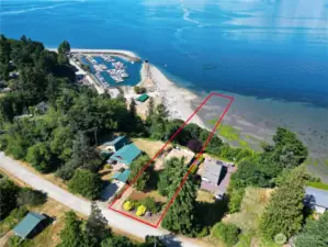 Seaside home with views of marina, mountains, Sound, city.