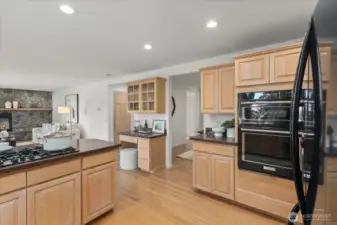 Built-in oven and microwave are set at the perfect height for convenience, with a deep storage drawer below for easy access to cookware and baking essentials.