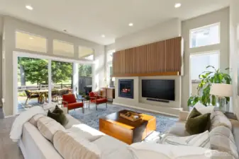 Custom Mantle in the great room. All the natural light!