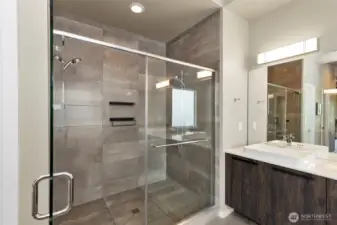 Luxury Spa shower with double shower heads and full tile walls