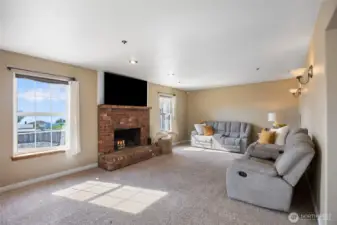 Large family room with wood burning fireplace