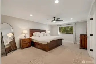 Spacious primary bedroom with en-suite.