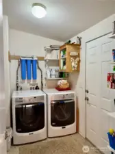 Utility Room with Exterior Access and Access to a Full Bath