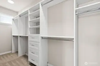 Love this built in closet system in the primary bedroom walk in closet!