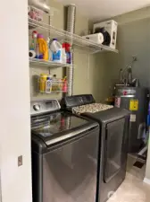 utility room off kitchen has 1/2 bath