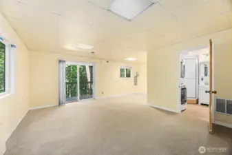 LARGE room with slider, leading to rear yard and deck.