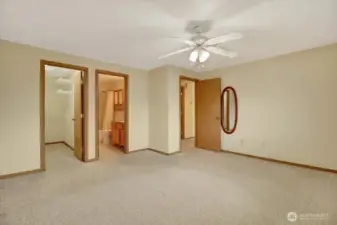 Primary has full bath and walk in closet with shelving