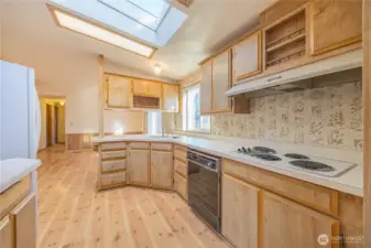 Large skylights cloak the kitchen in daylight.