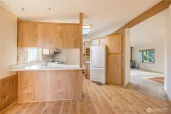 Kitchen opens to a wonderful "flex" space.