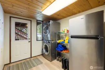 Lower Level Utility Room with Exterior Entrance plus Stacked Washer and Dryer