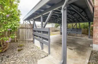 Carport at the back of the house accessible by private easement.