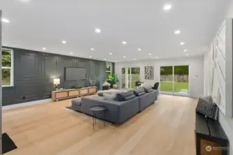 1st level family room.  Walk out to sizable flat back yard. This level includes separate exterior entrance (upper right hand corner of this photo).