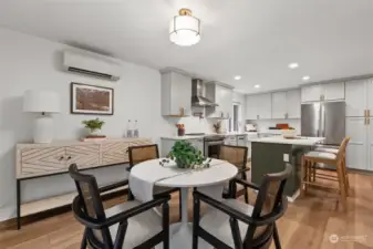 Kitchen eating space that ties right into the kitchen.