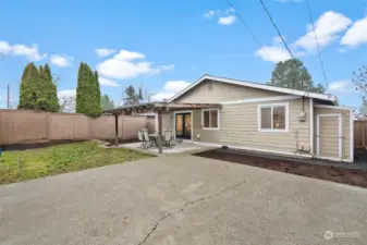 The backyard is fully fenced and has tons of storage. Summer time hangouts just got better!