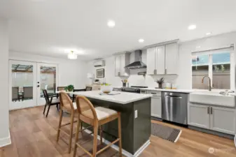 The open style kitchen is great for entertaining and perfect for the ambitious cook! Check out the pantry, the spice rack, and all the pull out drawers!