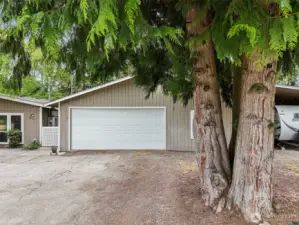 Detached 2-car garage plus covered RV parking!  Space for all of your toys!