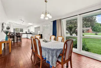 Open kitchen and dining room flow seamlessly.