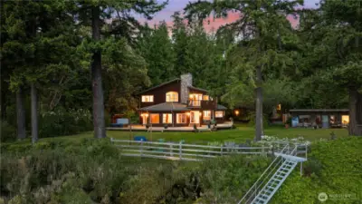 Waterfront Acreage Home w/ Guest Cottage, Shop, and 181' of Prime Sandy Beach~