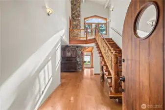 Soaring Ceilings, Wood, Stone and Views all Created on This Property~