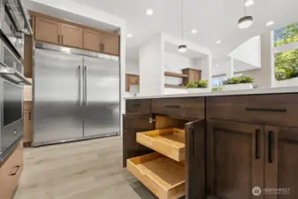 Plenty of storage throughout this kitchen. Pull out shelves for easier access.
