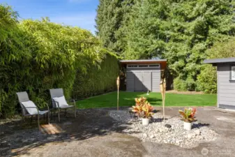 Addtional side yard play area with custom, matching storage unit