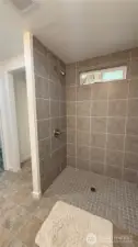 New tile in both bathrooms
