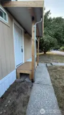 Renewed front covered porch.