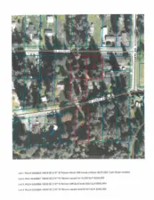 Estate sale includes these 2 homes and 2 vacant lots.