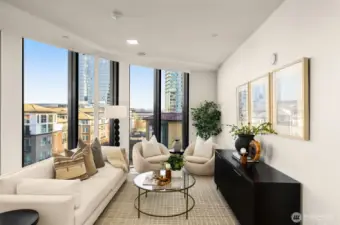 Living room with views of the Cascades from floor-to-ceiling windows