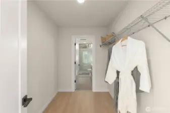 Large walk thru closet to primary bath