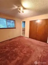 large enough for a King sized bed, that door leads to the primary bathroom