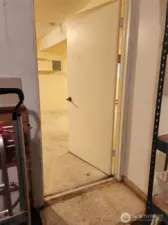 large room downstairs has a direct door to the garage