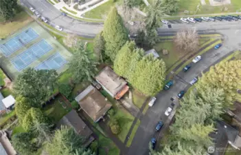 aerial view showing how close you are to the Gene Goodwin Memorial Tot Lot park and tennis courts