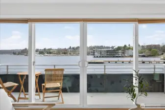 Private balcony just off the living room, offering sweeping views across Lake Washington and the perfect setting to relax and enjoy the waterfront
