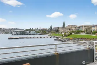 Views of David Brink Park and Pier from the private balcony, showcasing the vibrant waterfront setting along Lake Washington