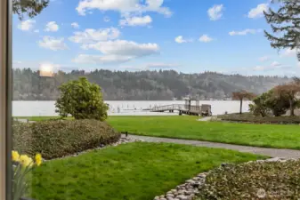 Imagine waking up to this breathtaking, unobstructed lake view—pure bliss every morning as the calm waters greet your eyes.